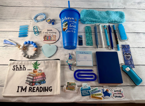 Blue book lover gift bundle with bookmarks, pens, sticky notes, socks and more