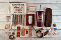 Brown book lover gift bundle with bookmarks, pens, sticky notes, socks and more