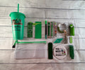Green mini book lover gift bundle with bookmarks, pens, sticky notes, socks and more