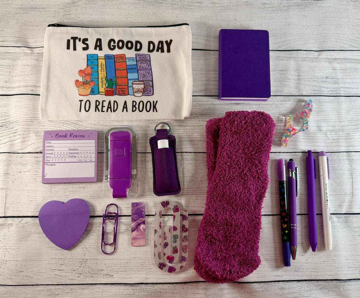 Purple mini book lover gift bundle with bookmarks, pens, sticky notes, socks and more