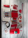 Red book lover gift bundle with bookmarks, pens, sticky notes, socks and more