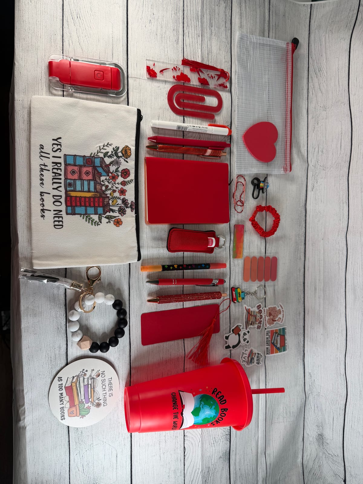 Red book lover gift bundle with bookmarks, pens, sticky notes, socks and more