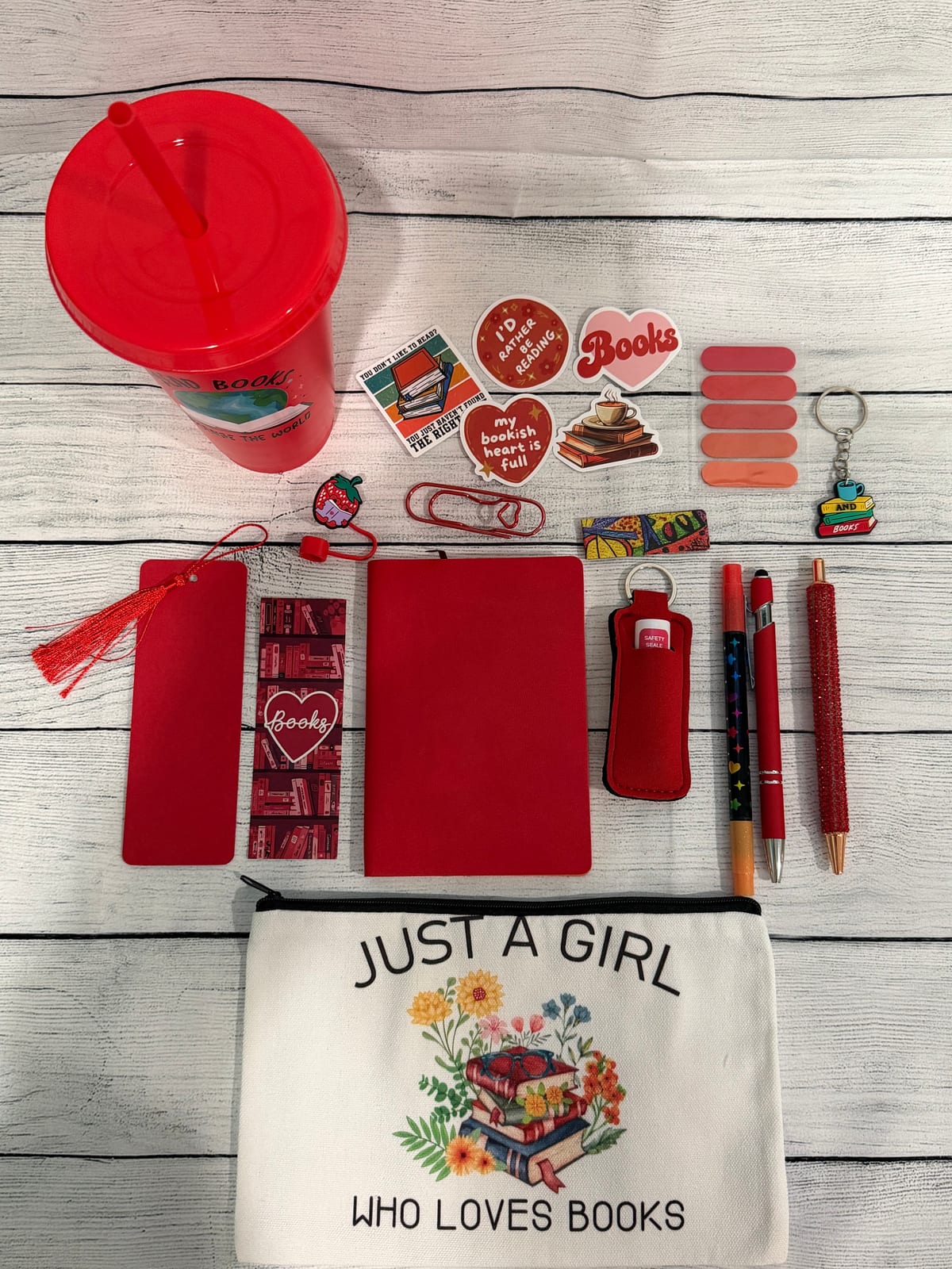 Red mini book lover gift bundle with bookmarks, pens, sticky notes, socks and more (photo 2)