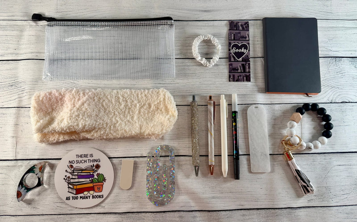 White mini book lover gift bundle with bookmarks, pens, sticky notes, socks and more