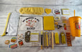Yellow book lover gift bundle with bookmarks, pens, sticky notes, socks and more